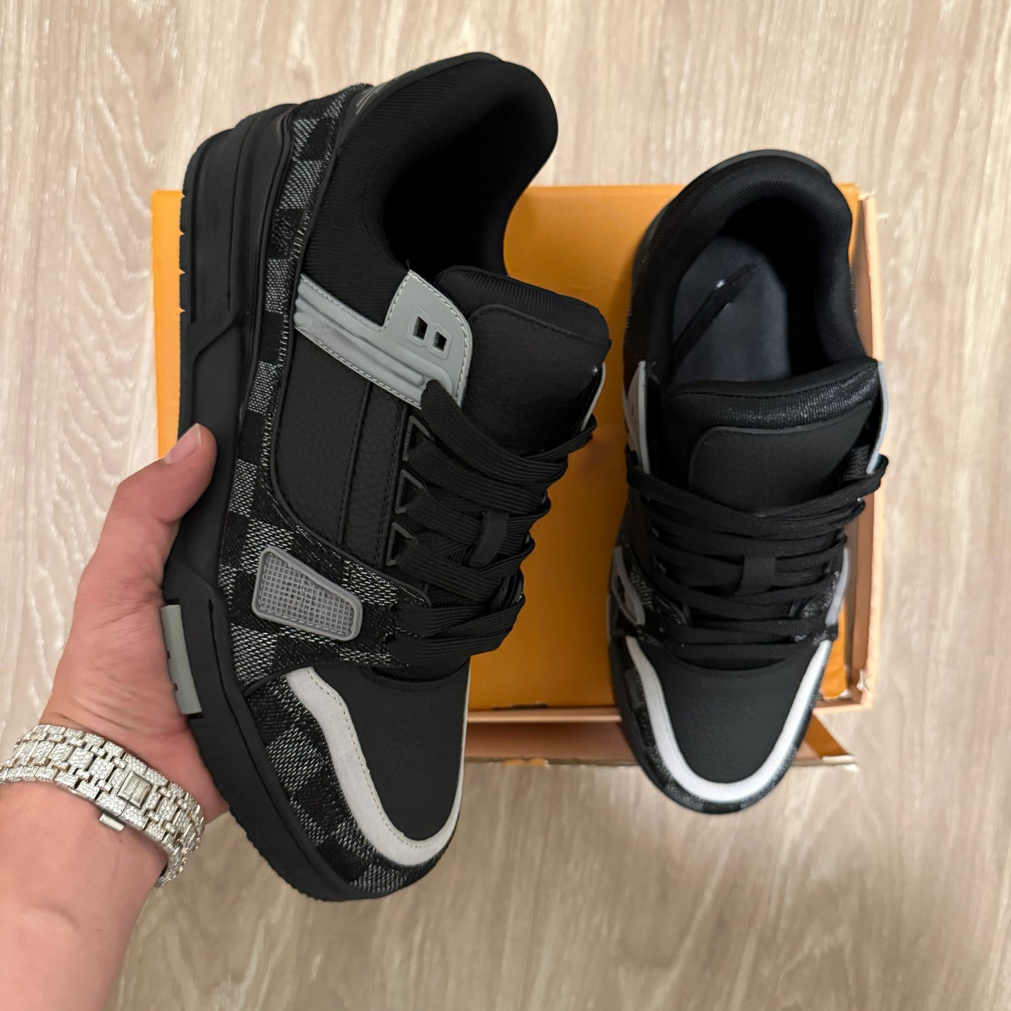 Black checkered trainers