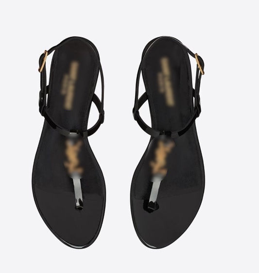 Gold and black Saint slides