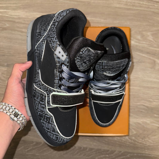 Black strap trainers